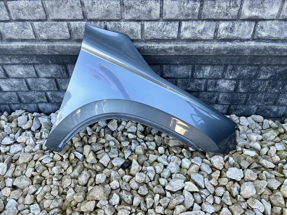 Blotnik przedni prawy bez rdzy Skoda Karoq 57A 17- oryginal LF7C