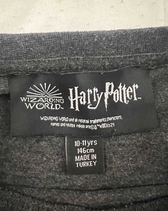 T-shirt Wizarding World Harry Potter com letras douradas de menina