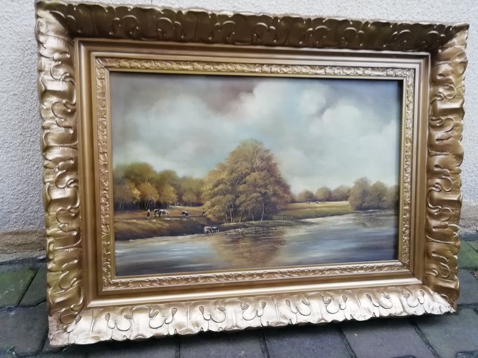 Obraz płótno - widok. Złota rama.