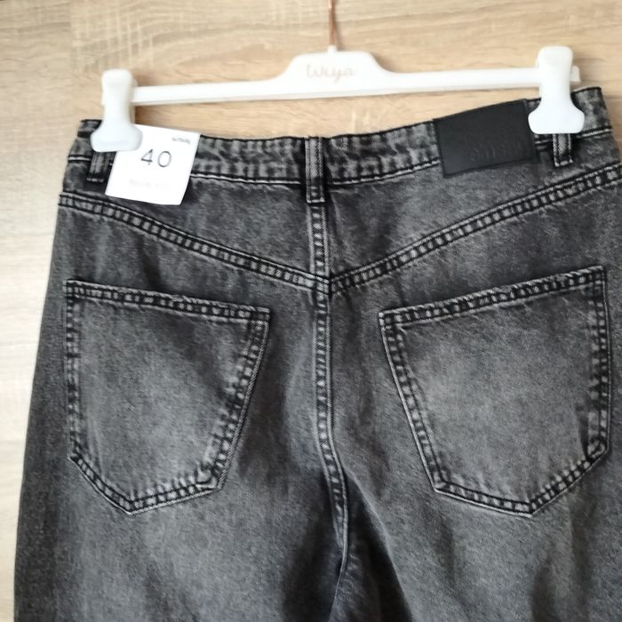 Nowe damskie spodnie jeans roz L Sinsay