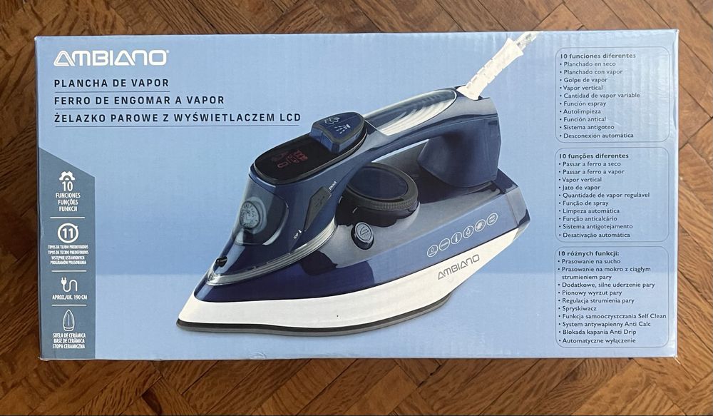 Ferro de engomar a vapor64285404728963120