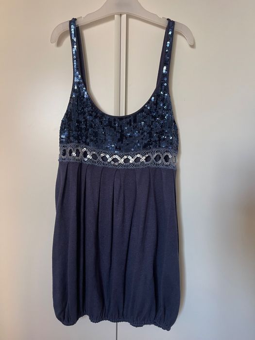 Conjunto de duas peças: Calças harém em seda e blusa de malha com lantejoulas