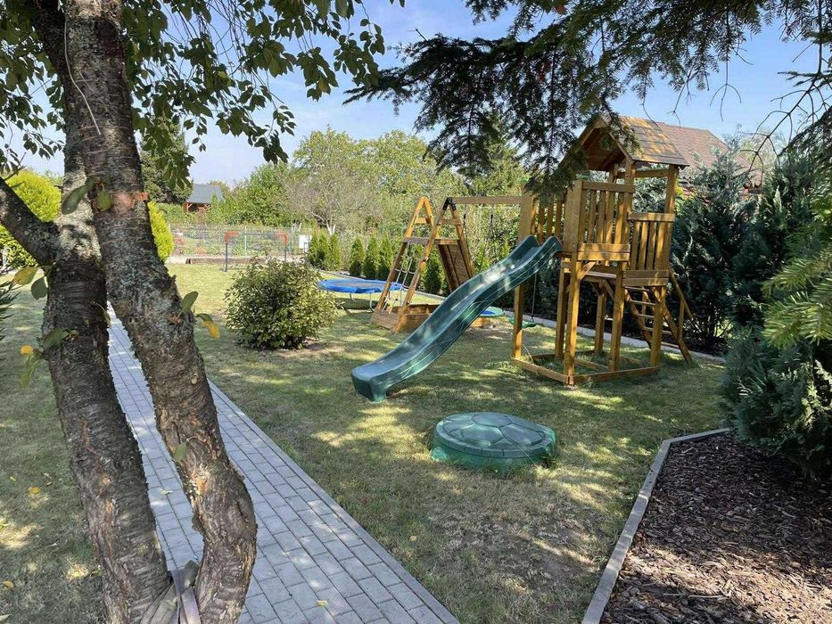Zadbana działka ROD Pod Lipami Września ul. Działkowców 411 m² – dużo zieleni, plac zabaw, idealna dla rodziny - Widok 3