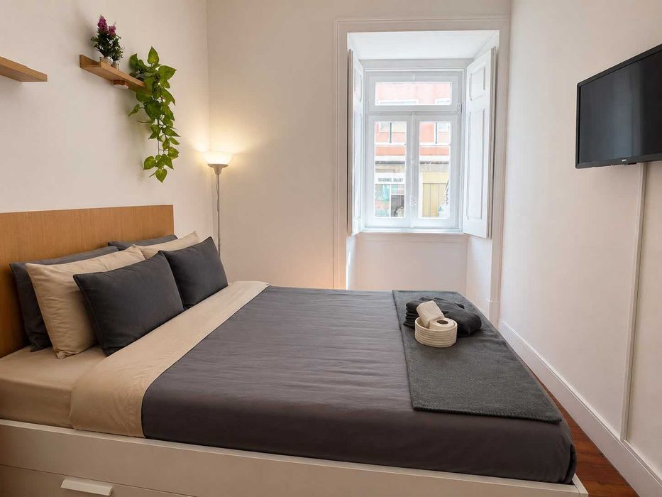 Quarto no coração de Arroios