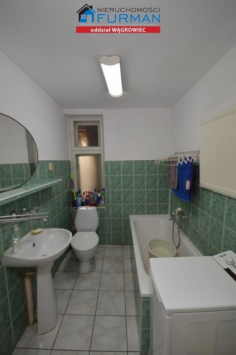 Dom jednorodzinny z budynkami gospodarczymi ŁEKNO