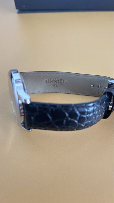 Relogio Tissot com pequena inscrição