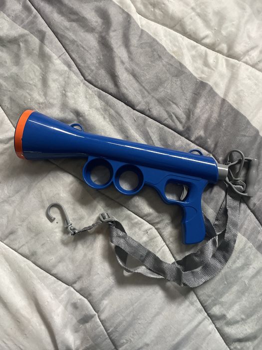 Atirador de bolas para animais