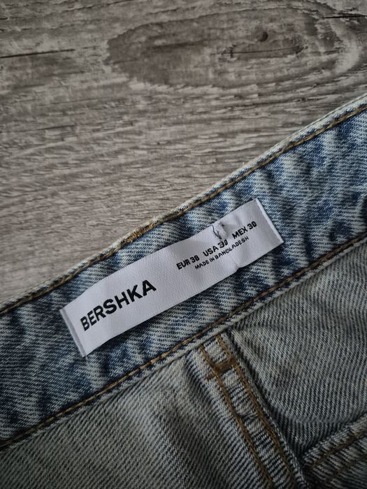 Luźne spodnie jeansy baggy Bershka M