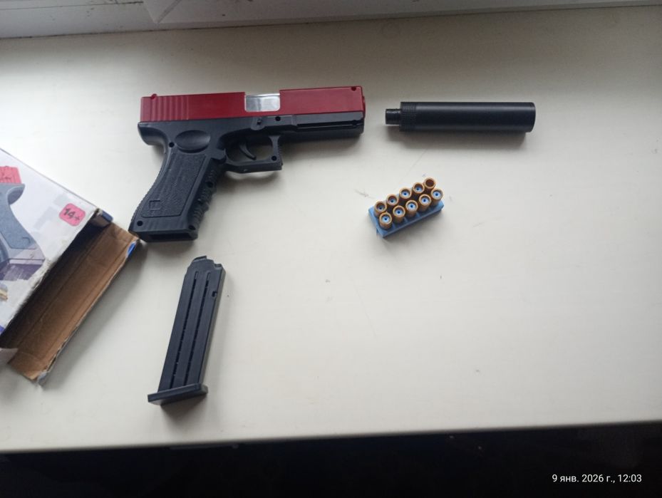 Детский пистолет с вибррсом гильз