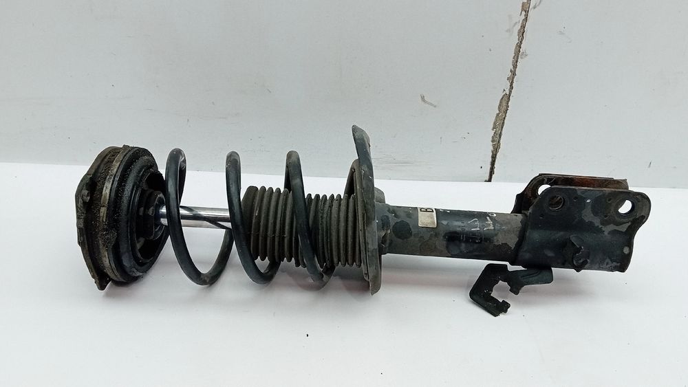 Amortecedor frente esquerdo NISSAN Pulsar Hatchback (C13)