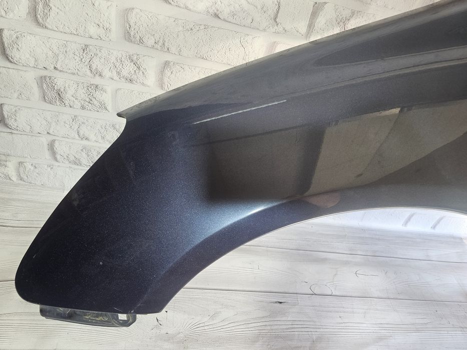 Оригінальне крило Ліве / Праве Honda Civic 7 EU