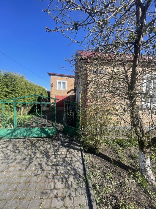 Частина будинку з житловою добудовою та гаражем - Вид 4
