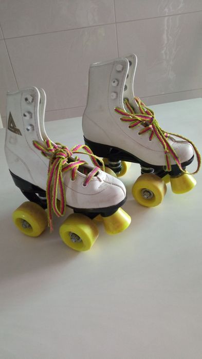 Patins.   4  rodas. n° 31