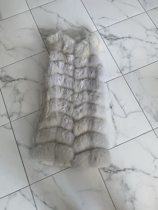 Жіноча желетка із песца