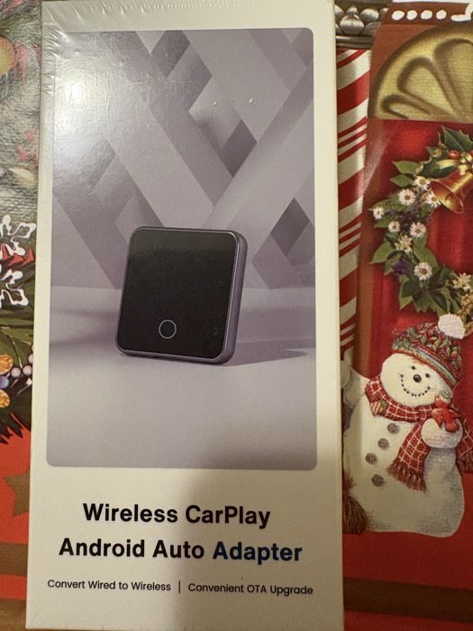 Це адаптер Wireless CarPlay / Android Auto.