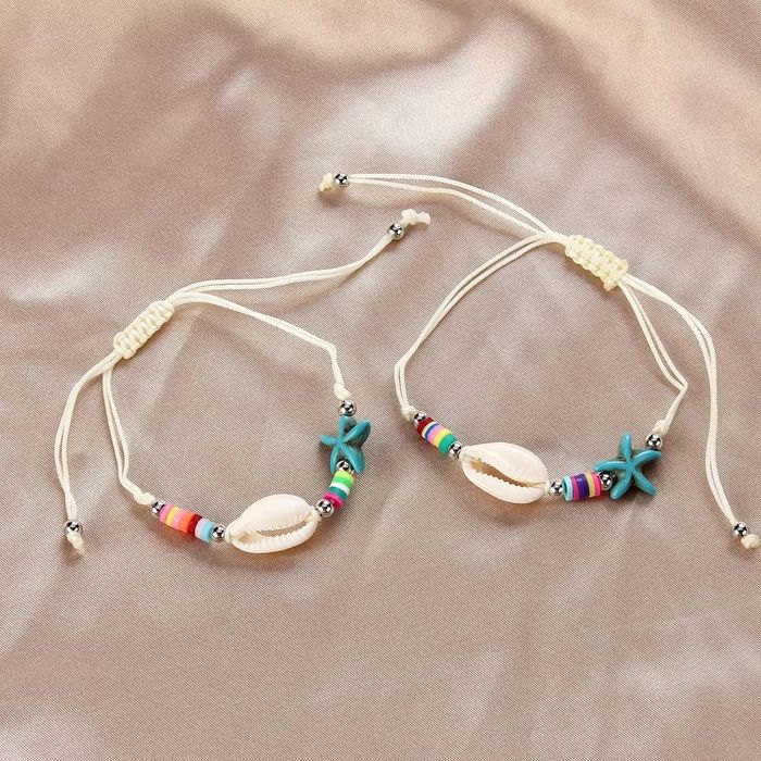 Pulseira/tornozeleira estrela do mar e búzios. 
Lindíssim