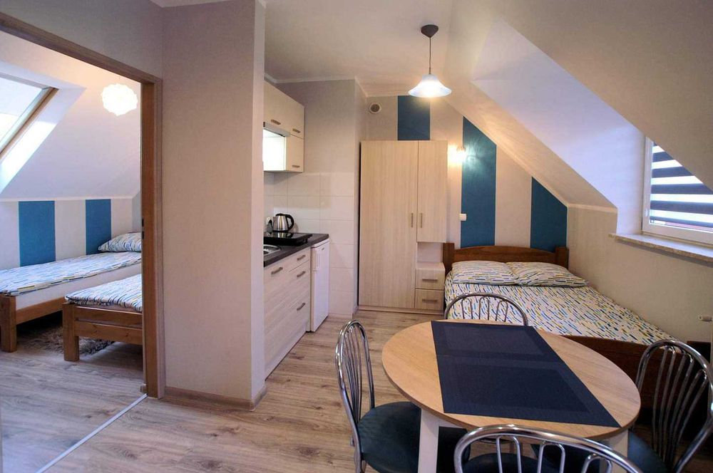 Noclegi w apartamentach/pokojach ,, Pod Łysicą''