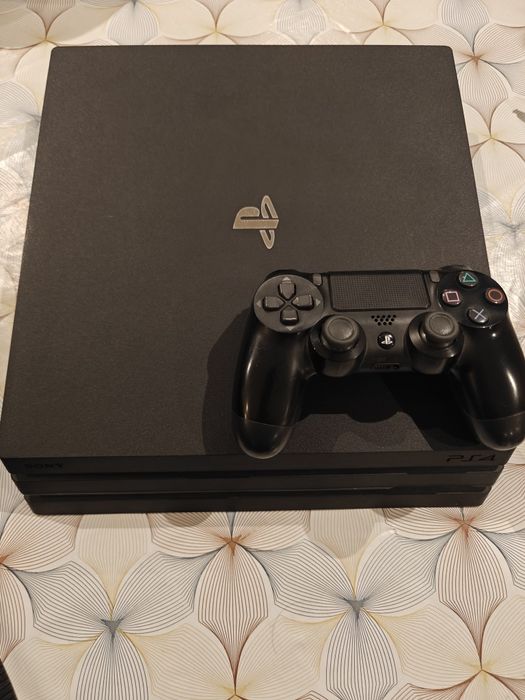 PlayStation 4 PRO jak nowe  oraz 9  super ciekawych gier