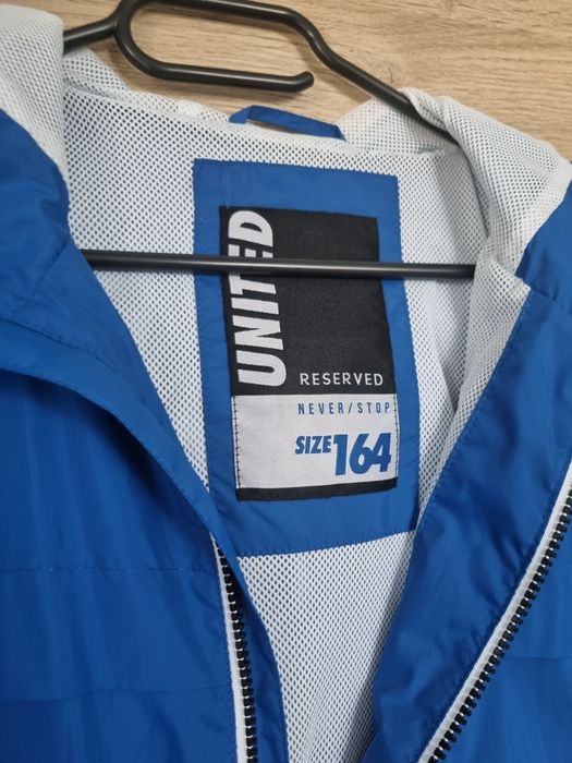 Kurtka wiatrówka przejściowa chłopięca niebieska rozmiar 164cm