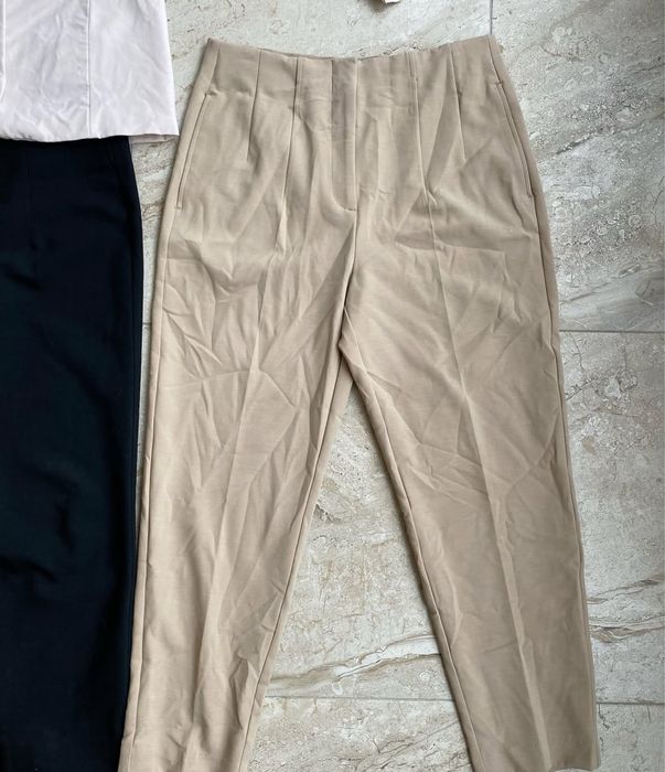 Бежеві брюки жіночі