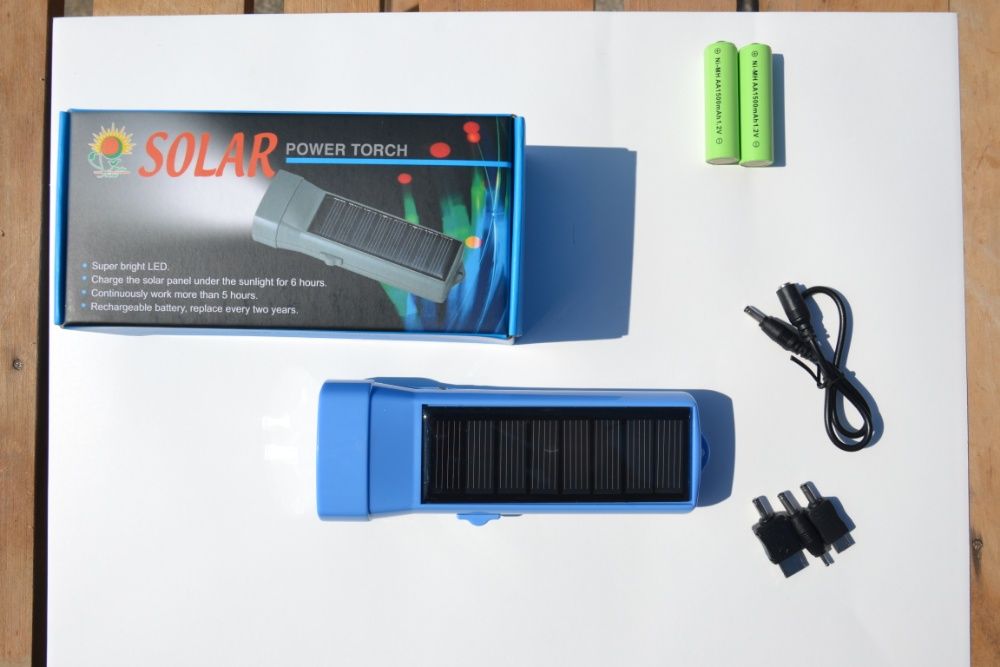 Фонарь. Фонарик на солнечной батареи+зарядное