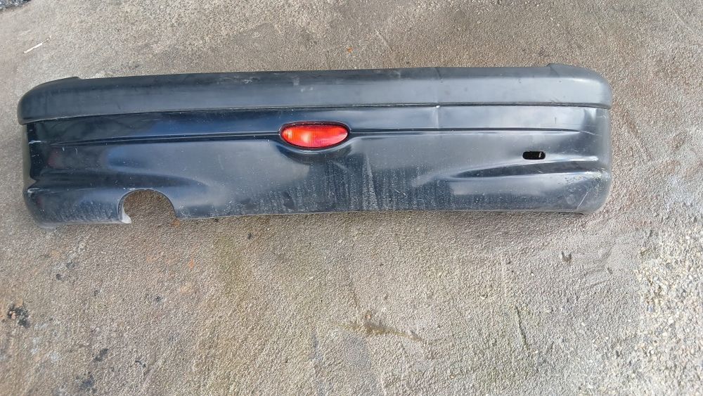 Para-choques traseiro Peugeot 206 
Pe