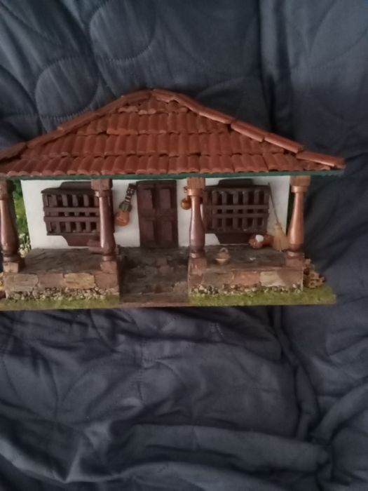 Miniatura de casa  rural latino americana em artesanato
