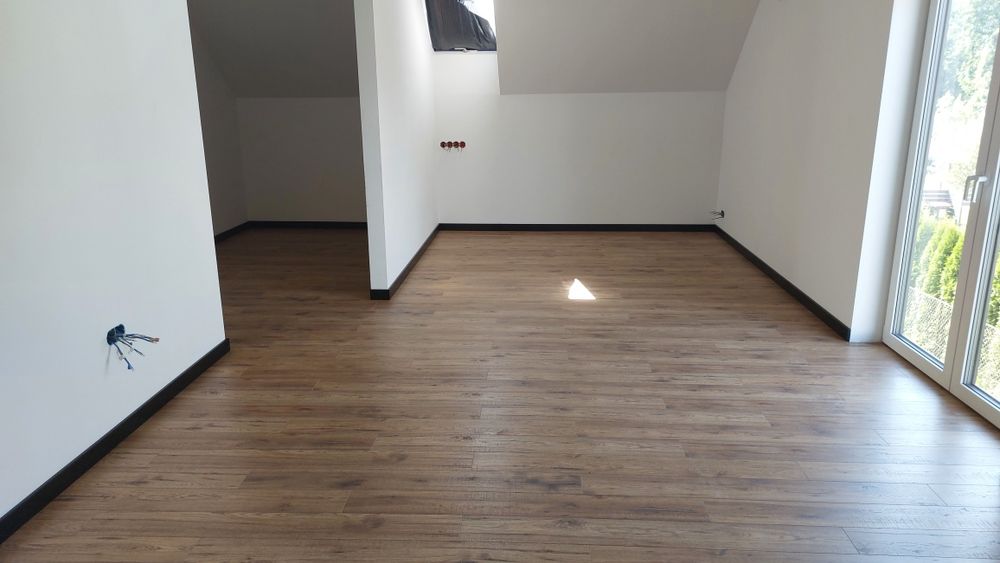 Układanie montaż Paneli podłogowych i Deski warstwowej