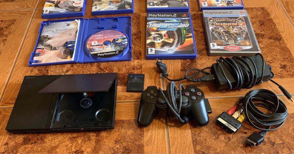 PlayStation 2 Slim / Functional – 7 Games / Original Controller and Cables64297944998913122