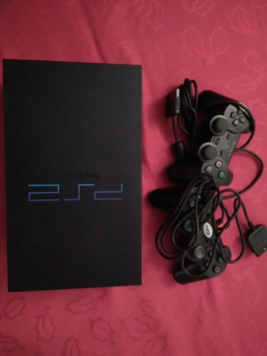 PS2 2 + jogos + comandos Buzz + 2 camara eye toy