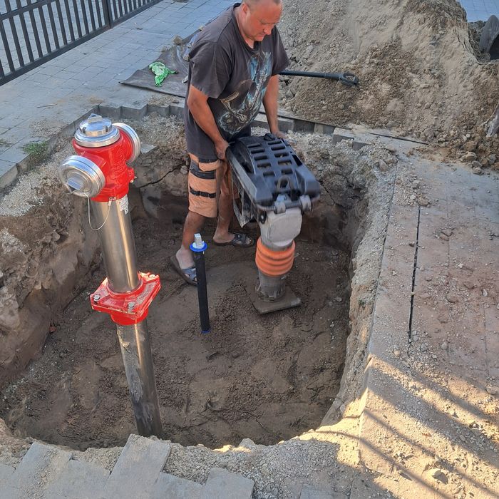 Uslugi minikoparka koparka układanie kostki prace ziemne hydranty