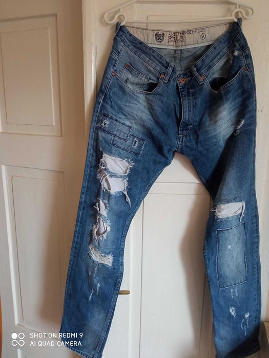 Spodnie jeans  dziury przetarcia 32/32