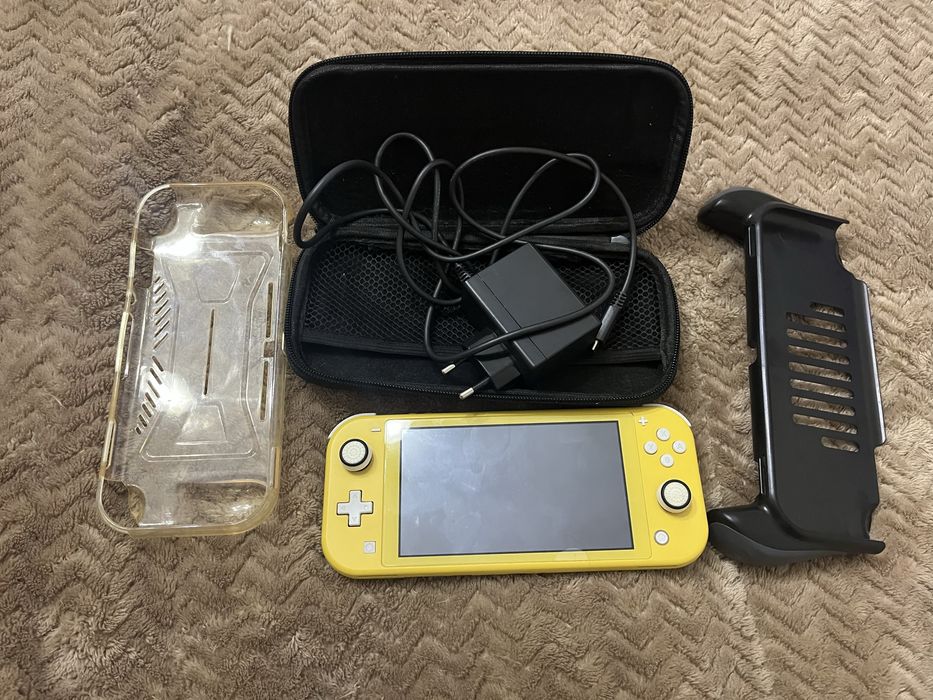Nintendo Switch Lite + acessórios