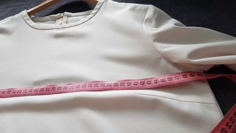 Elegancka beżowa bluzka z rękawem 3/4, oversize