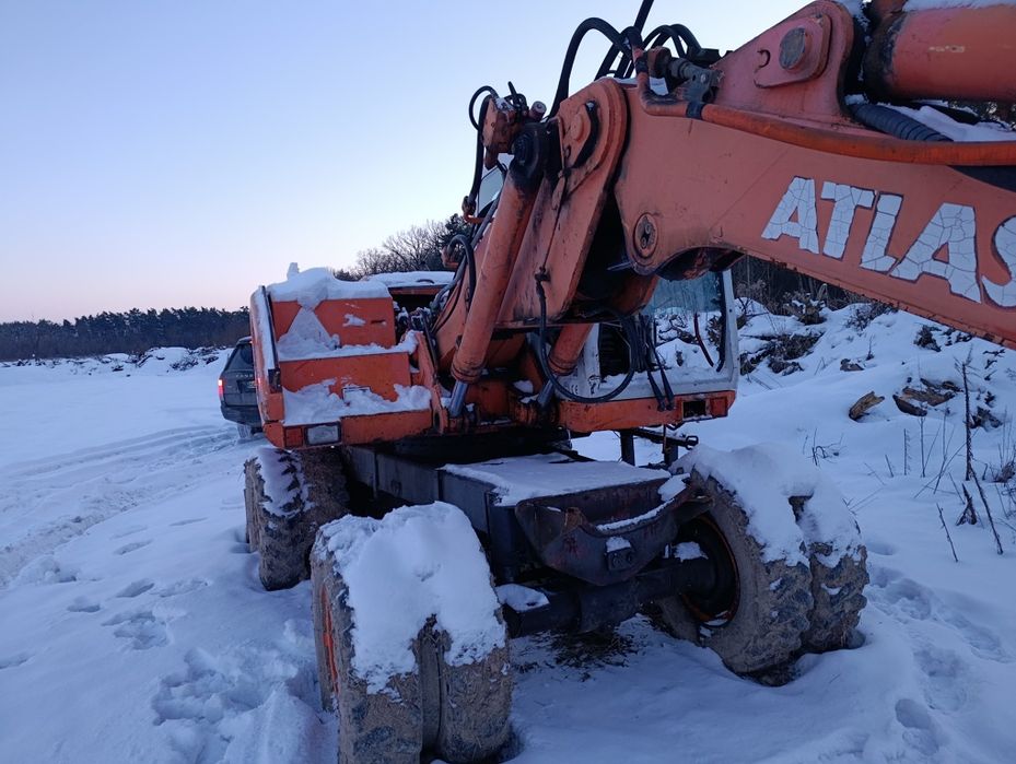 Екскаватор атлас 1404