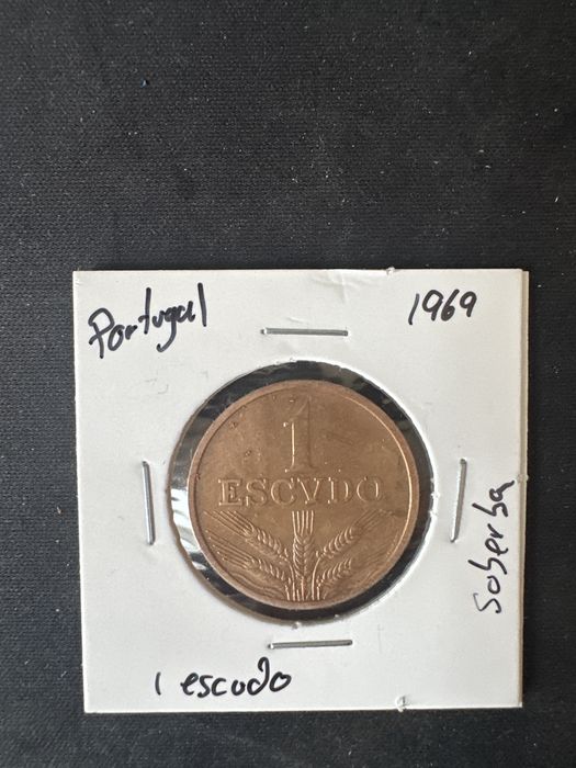 Moeda 1 escudo 69 soberba