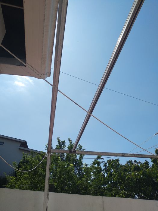 Pérgola de encostar com tecido