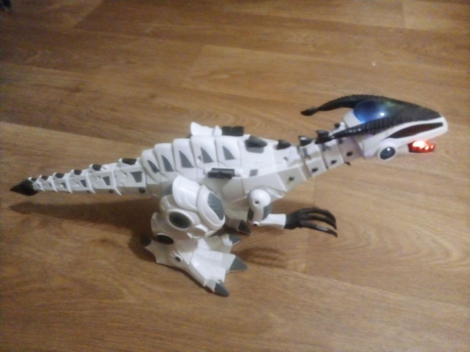 Динозавр робот  .