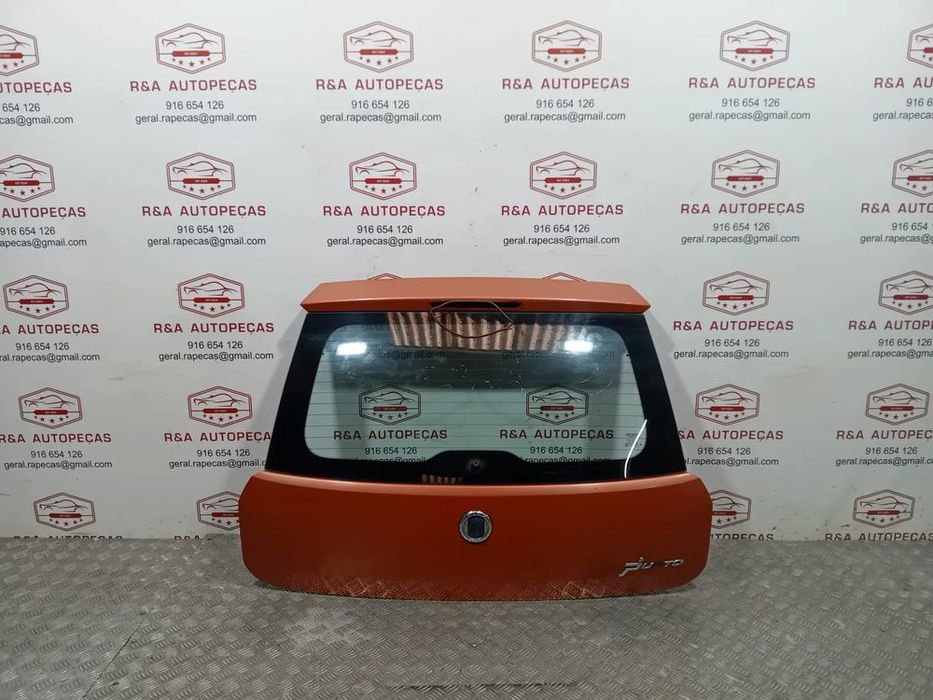 Tampa de Mala Fiat Grand Punto 199 Original