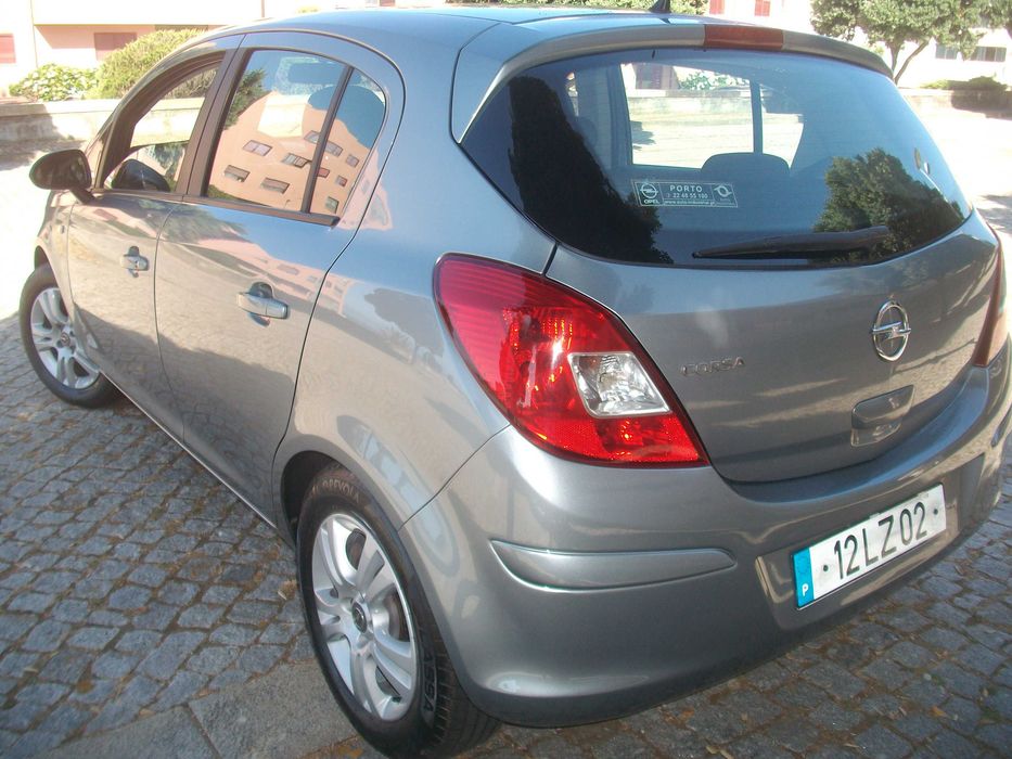 Opel Corsa 1.2 GLP/Gasolina de 2011 C/Novo