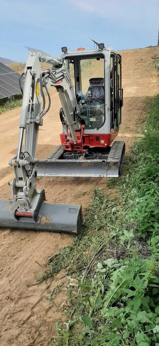 usługi minikoparką , minikoparka Giżycko, koparka, koparko-ładowarka