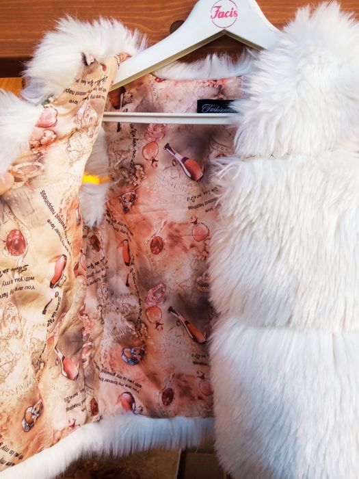 Жилєтка на дівчинку