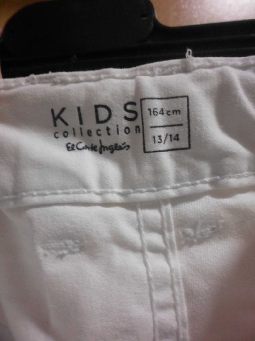 calças brancas para rapaz da marca Kids