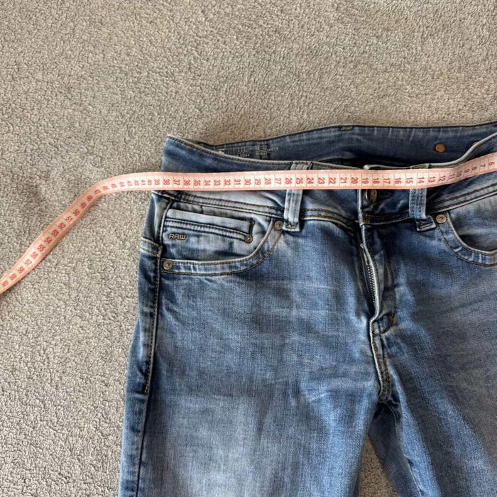 джинси кльош на низькій посадці