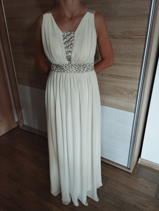 Długa jasna elastyczna sukienka ecru