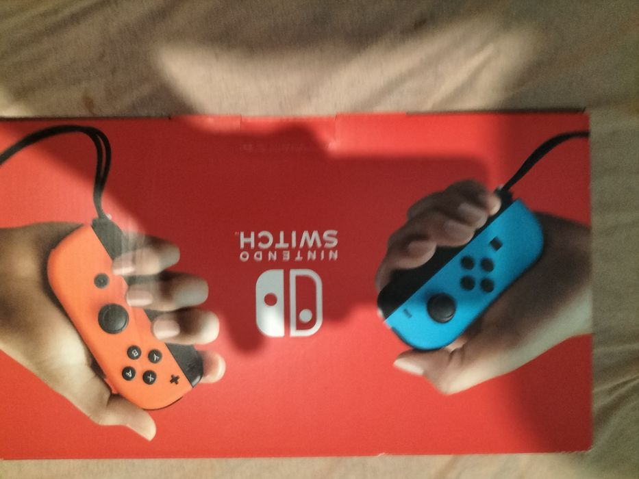 Nintendo Switch (comando azul e vermelho)64354256203010121