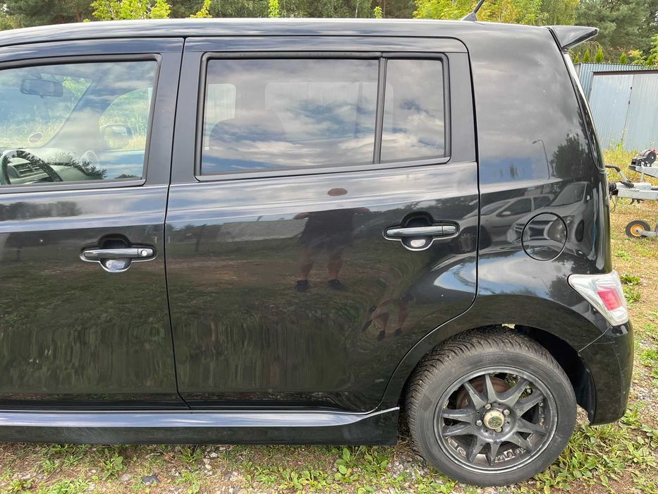 drzwi tył tylne tylnie lewe daihatsu materia x07 czarne 2006 - 2011
