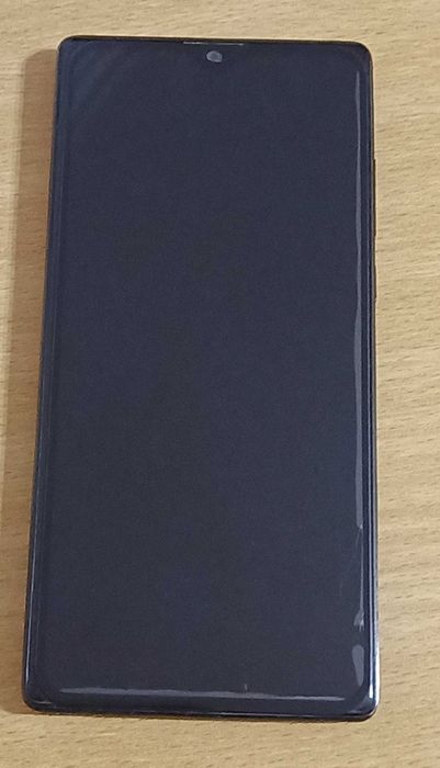 Tablet novo e smartphone usado em muito bom estado.