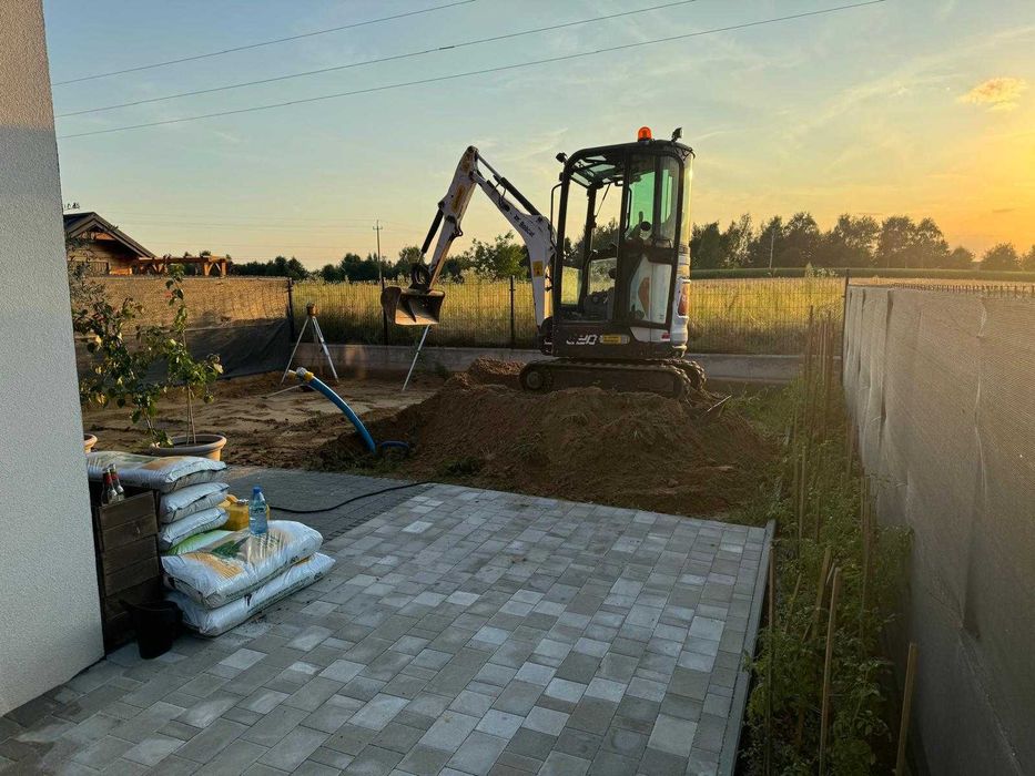 Usługi koparką odwodnienia budynków drenaż przydomowe oczyszczalnie