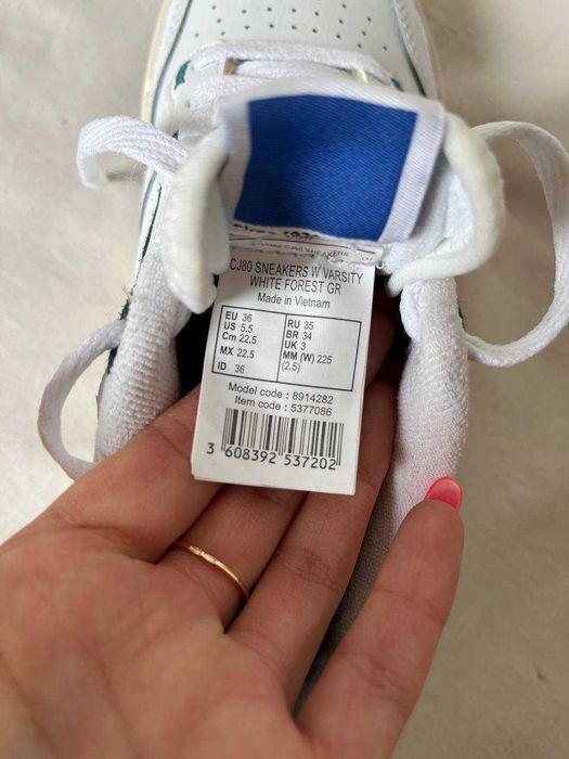 Білі кросівки Decathlon